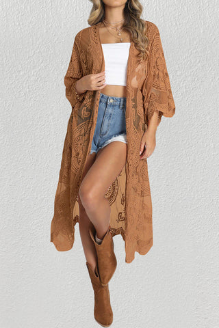 A woman wear a brown lace kimono cardigan.