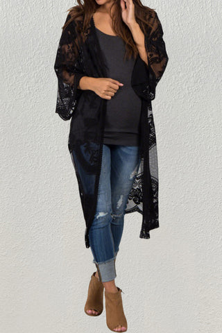 A woman wear a sheer kimono cardigan fashion with T-shirt.