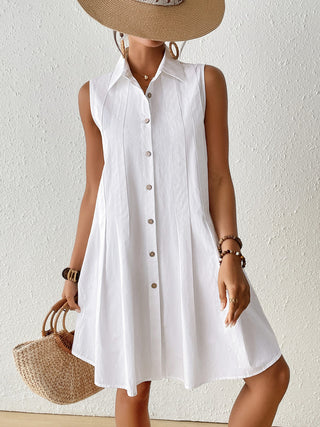 Elegant white cotton cover-up dress for beach and pool.